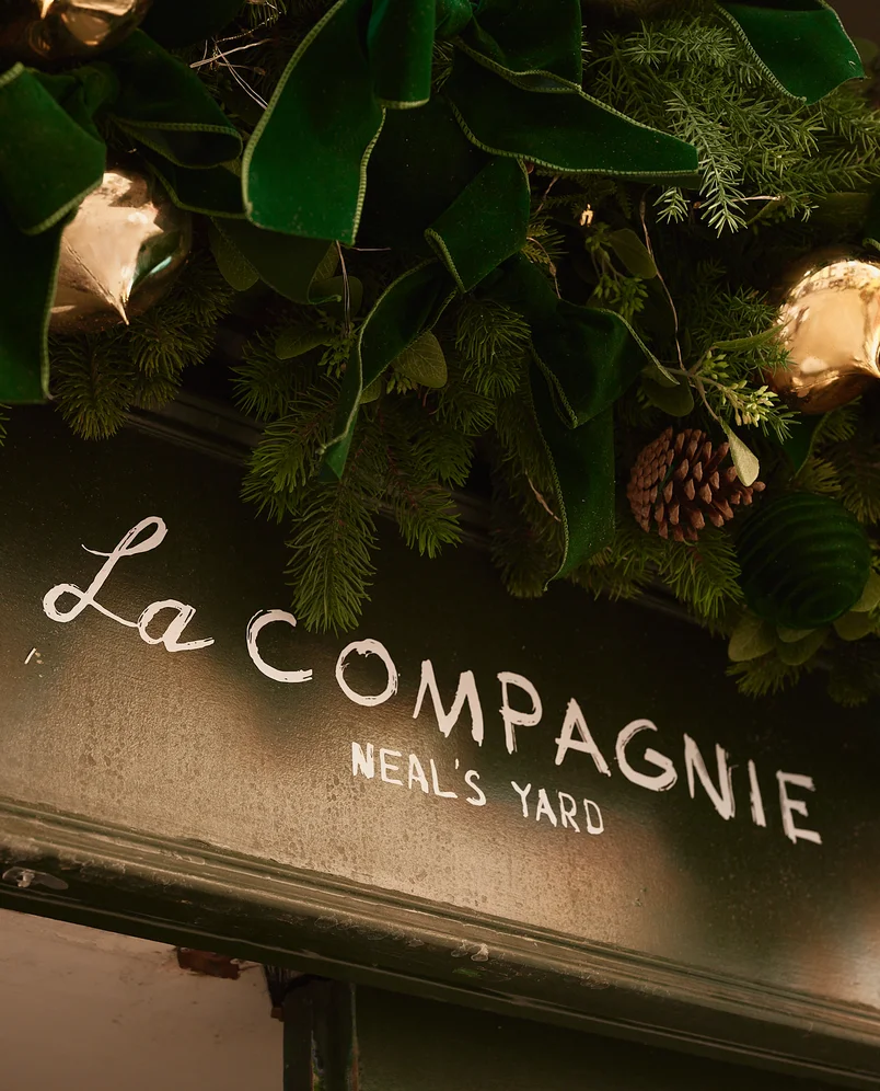 Close-up of the signage and festive decorations, La Compagnie, Neal's Yard, Experimental Group.