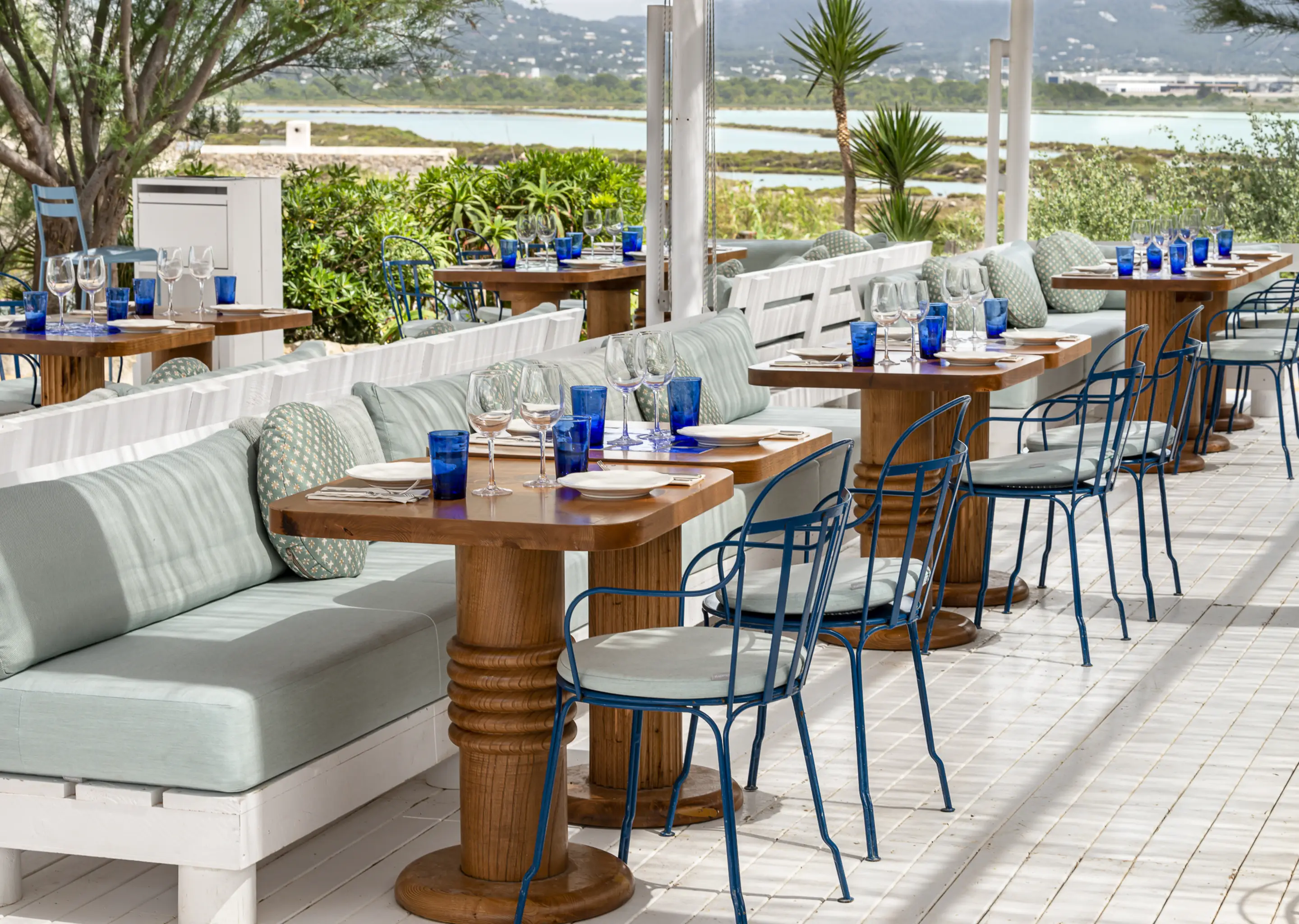 Elegant restaurant terrace with blue furniture, Experimental Group, Ibiza.