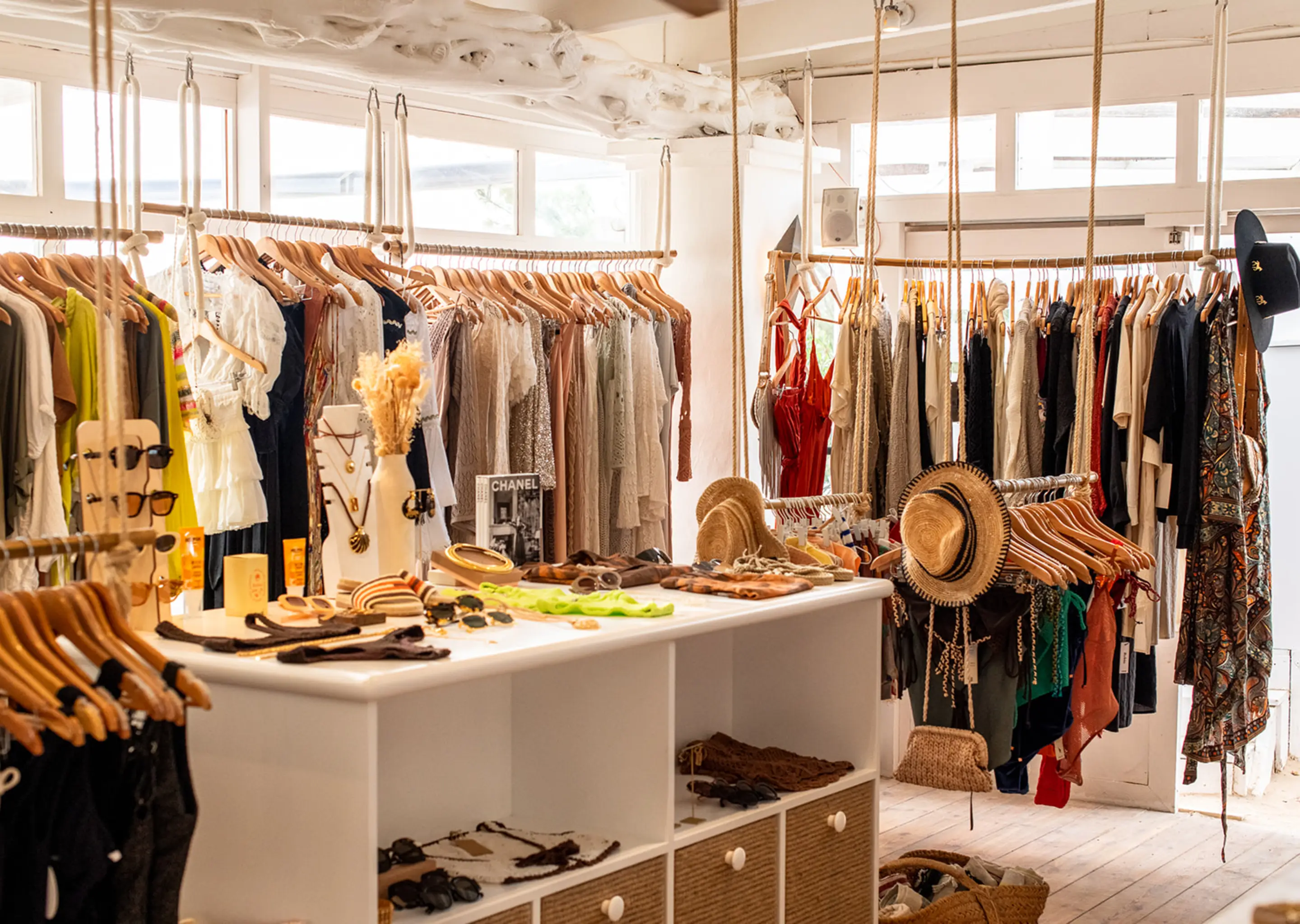 Clothing racks and interior decor details in the Experimental Group lifestyle boutique.
