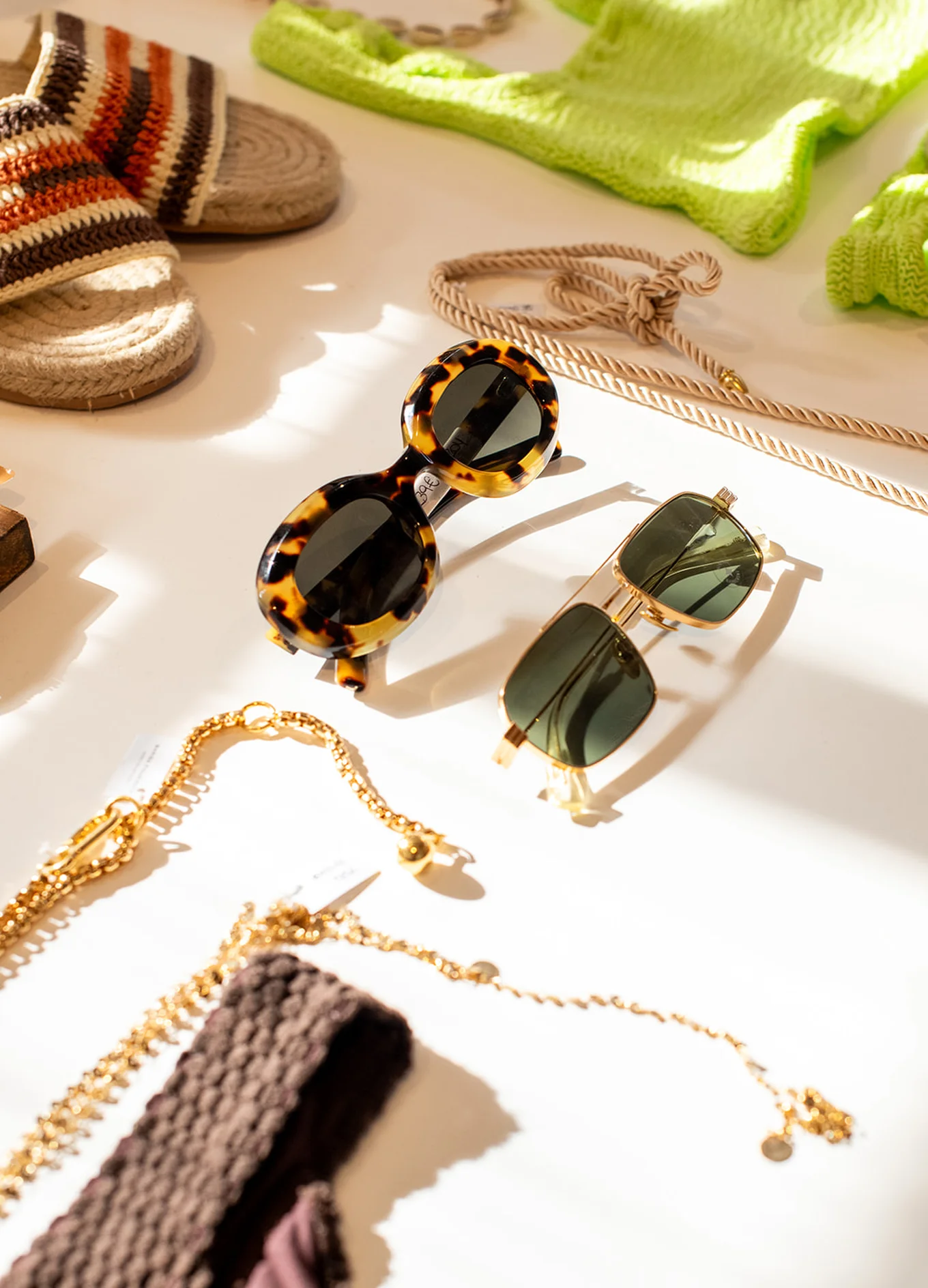 Selection of fashion accessories, sunglasses, and jewelry at the Experimental Group lifestyle boutique.