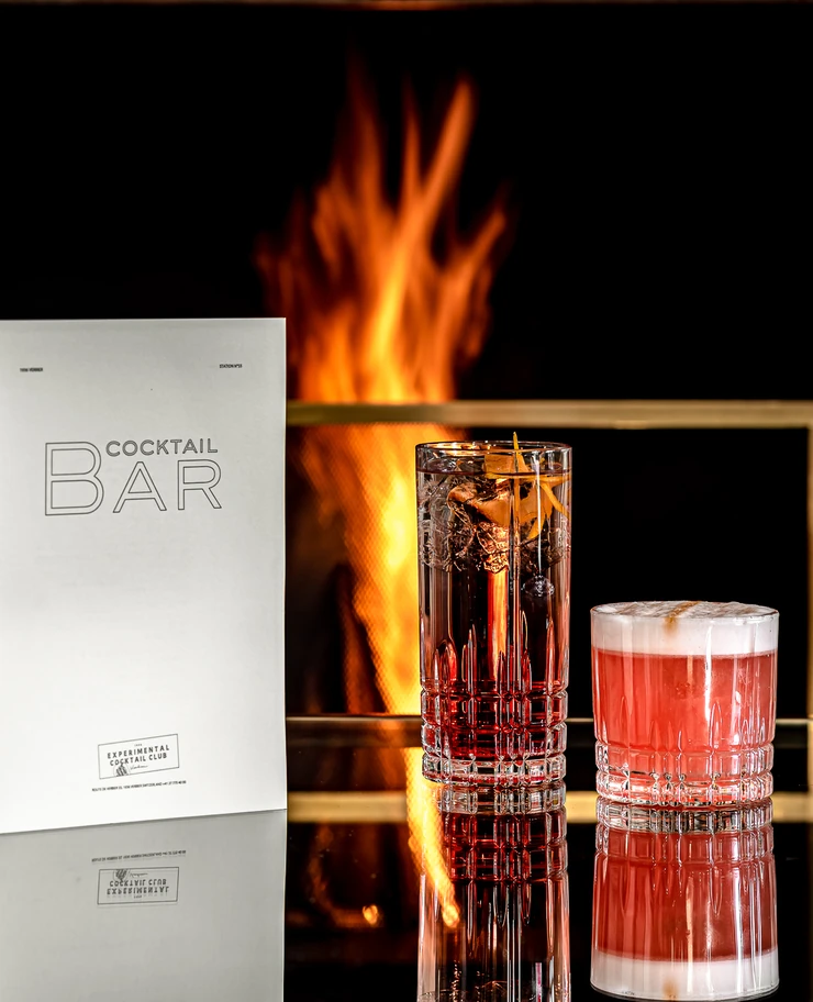 Gourmet cocktails served in an intimate atmosphere by the fire at the Experimental Cocktail Club, Verbier.