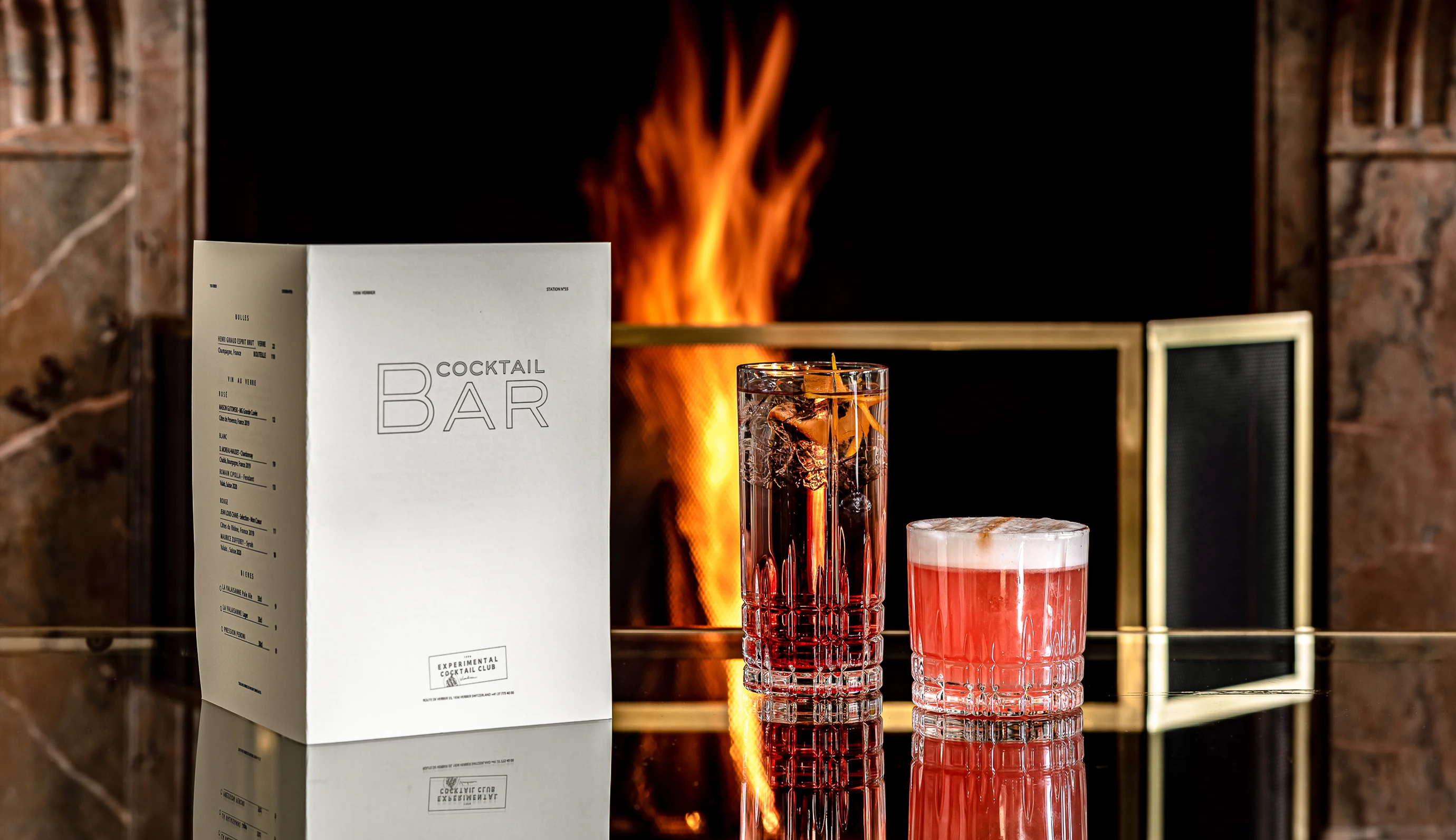 Exclusive cocktail menu and signature drinks by the fireplace at the Experimental Cocktail Club, Verbier.