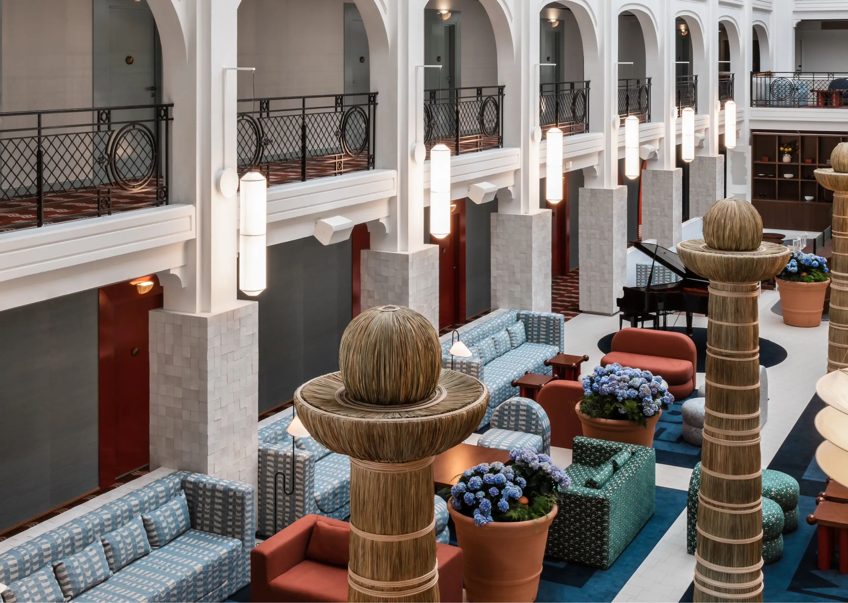 Overhead view of the elegant and designer lobby at Experimental Roma hotel in Rome.