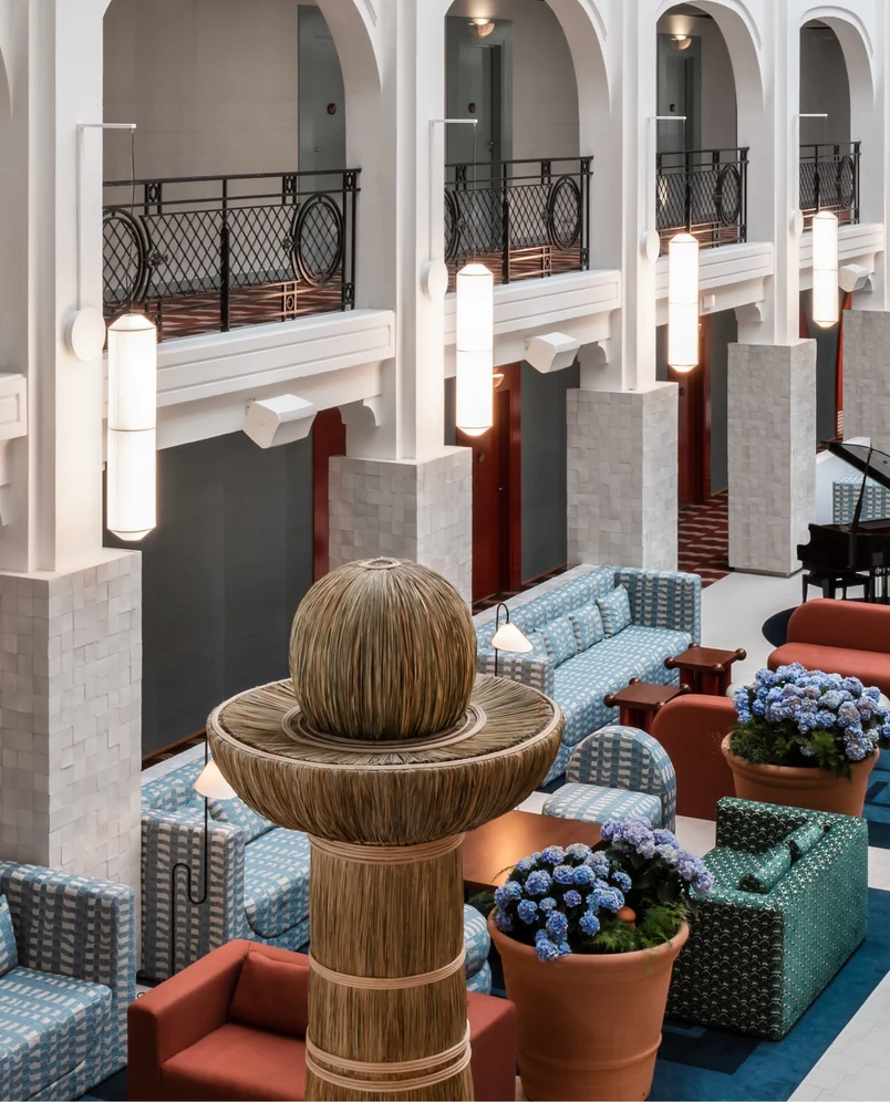 Architectural detail showing arches and raffia columns, Experimental Roma hotel, Rome.