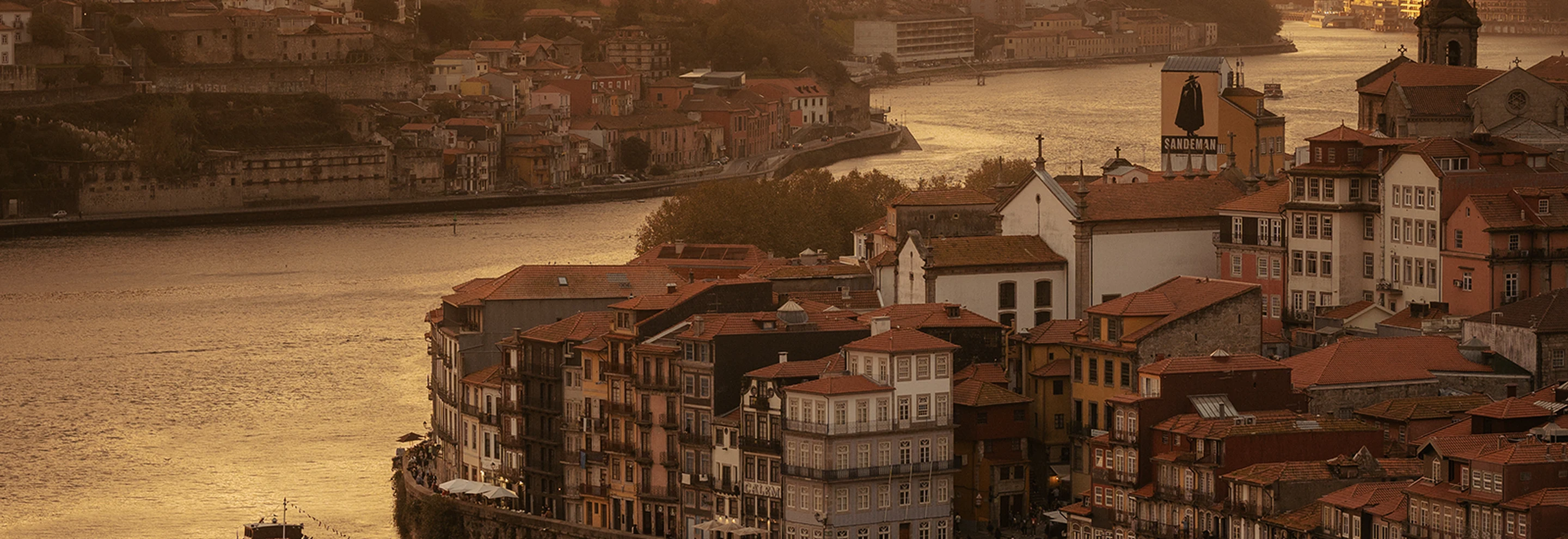 Panoramic sunset view over the Douro riverbanks and historic architecture in Porto, Experimental Group.
