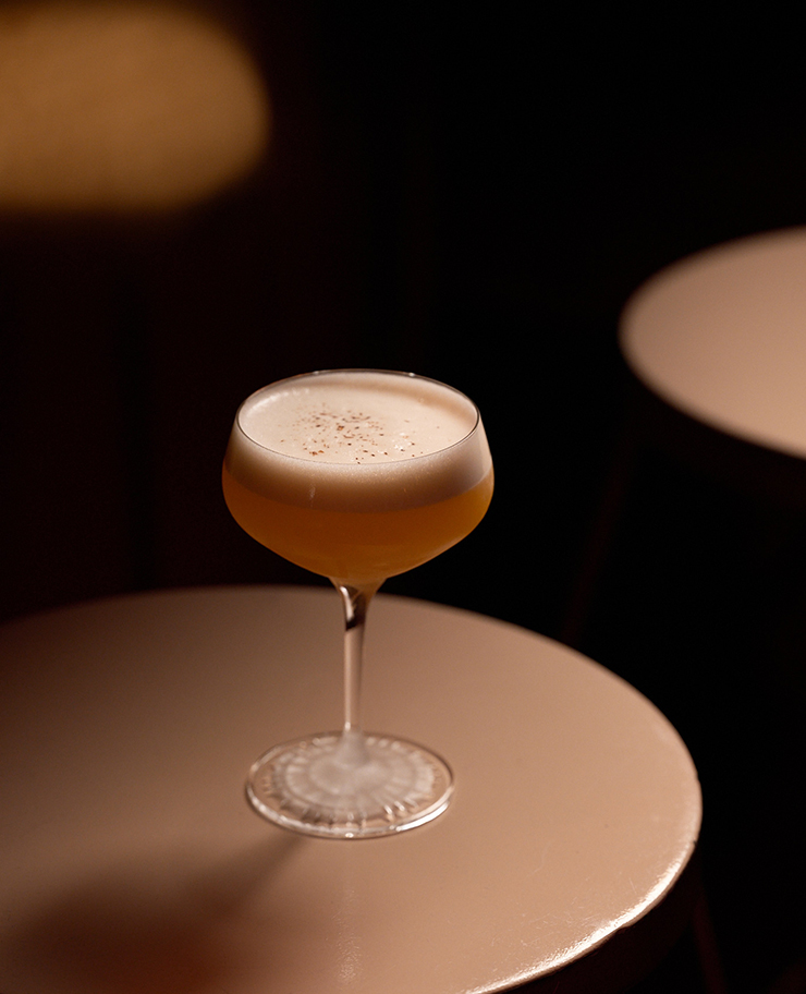 Signature cocktail served in an elegant stemmed glass at Palazzo Experimental, Venice.