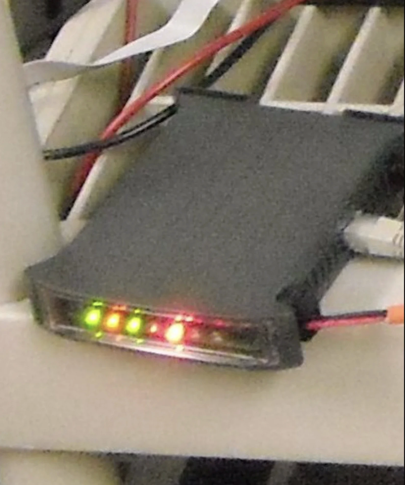 Fieldbus Analyzer thumbnail – compact prototype bus analyzer with status LEDs active during laboratory system testing