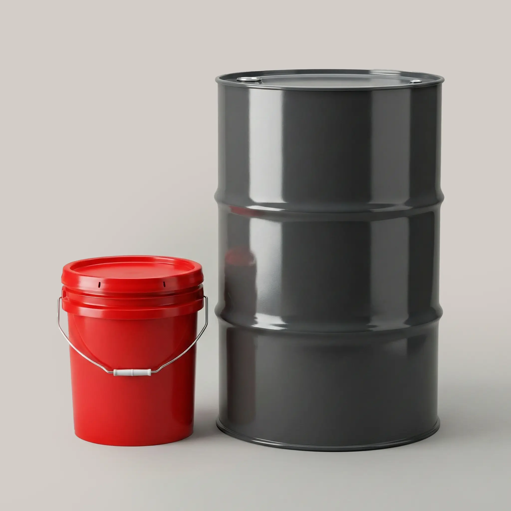 Un tambor de acero negro y una cubeta de plástico roja.
