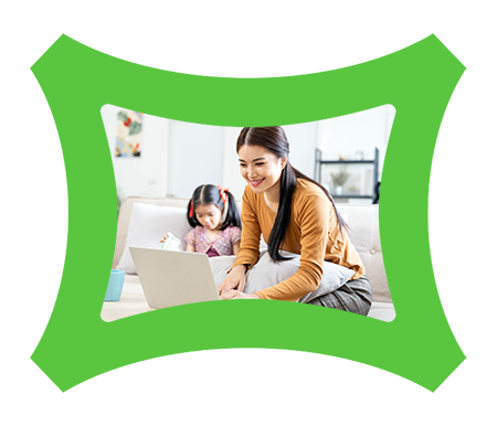 Lady on laptop with child in background