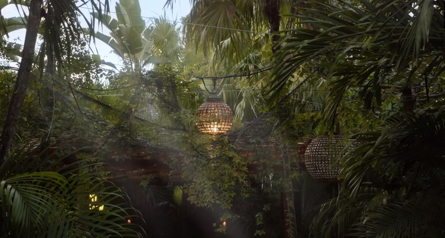 Gourmet avocado toast and a refreshing cocktail served by the pool at La Valise Tulum hotel, showcasing the restaurant's luxurious tropical dining experience.
