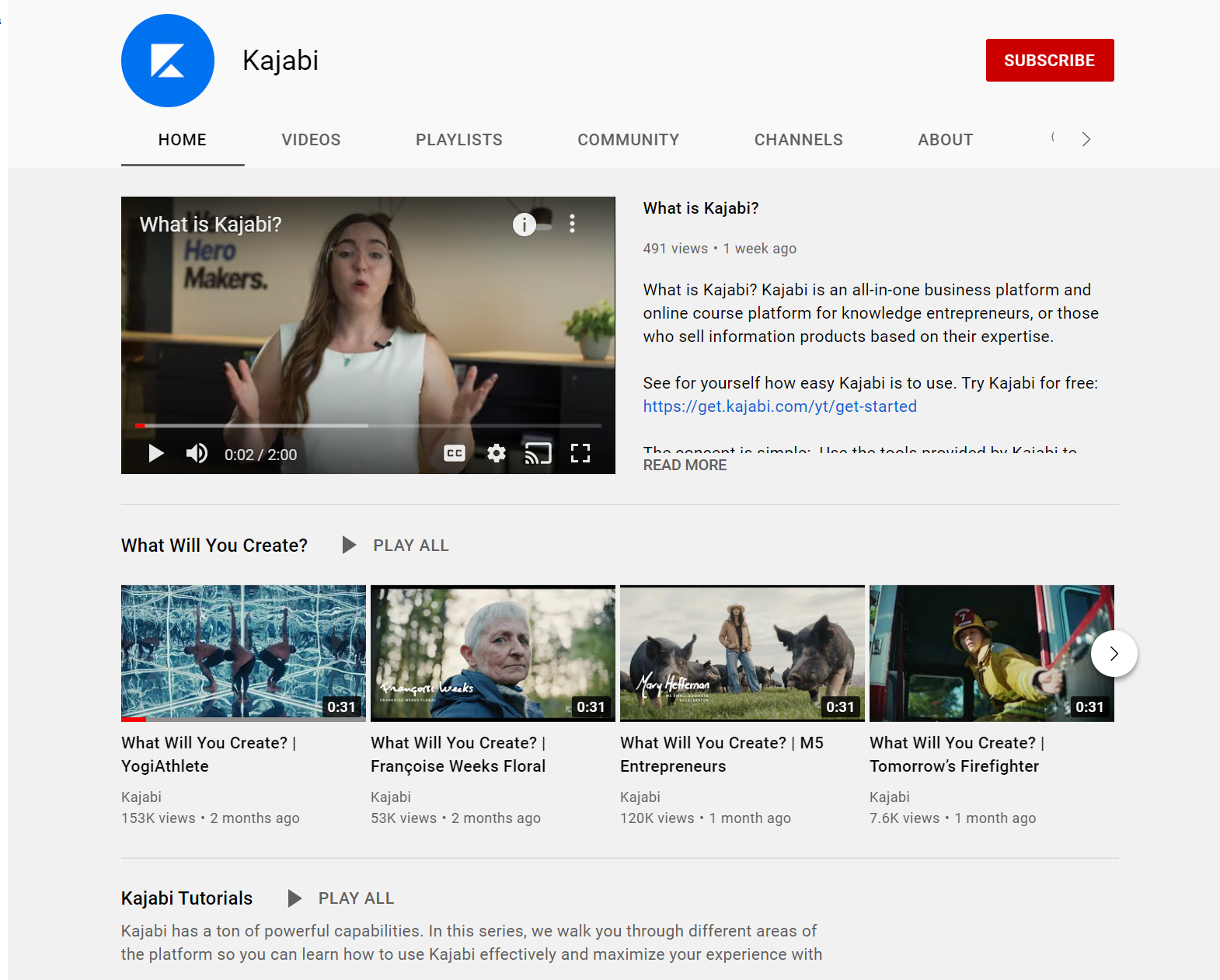 Kajabi YouTube channel showing a What Is Kajabi paused video and the What Will You Create playlist