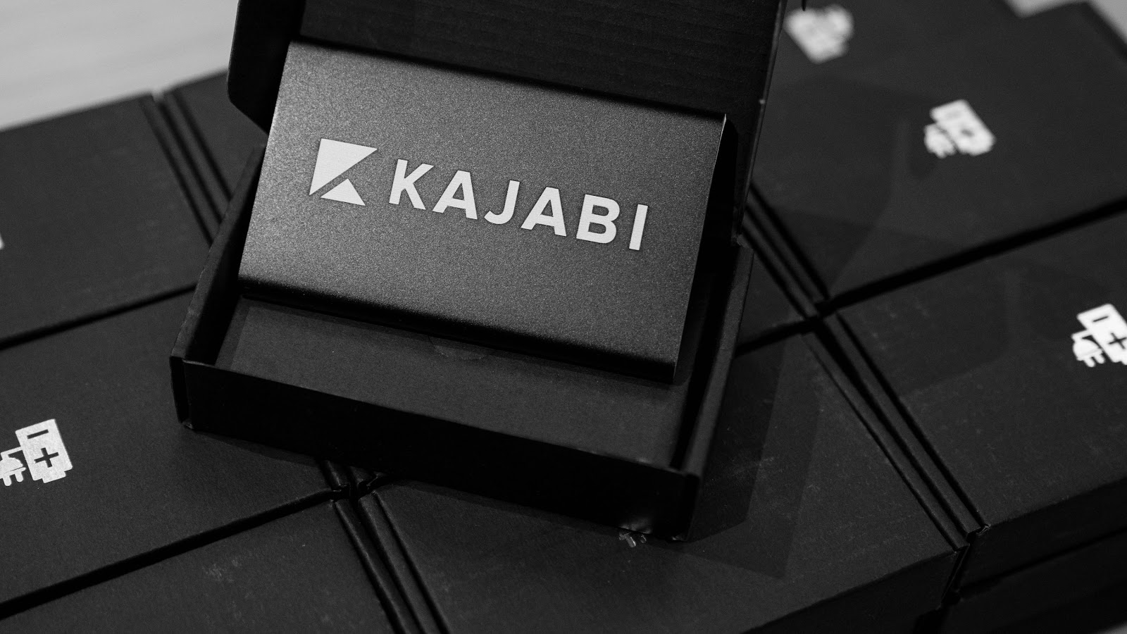 Kajabi logo on a business card