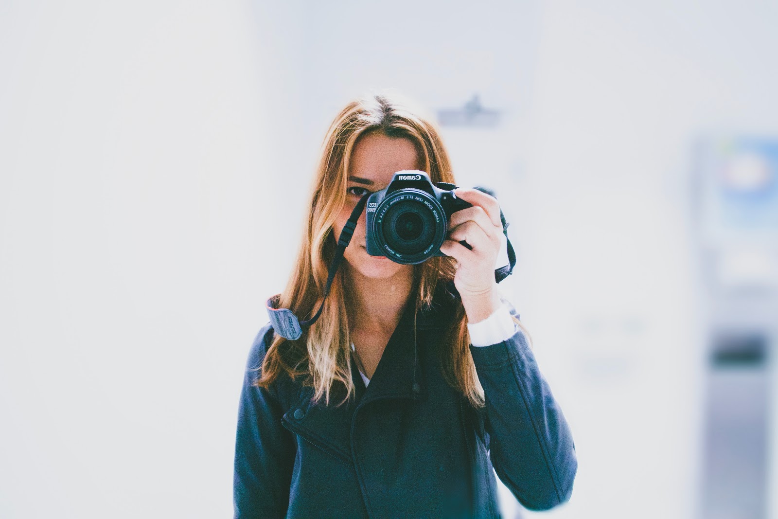 Person pointing camera at you