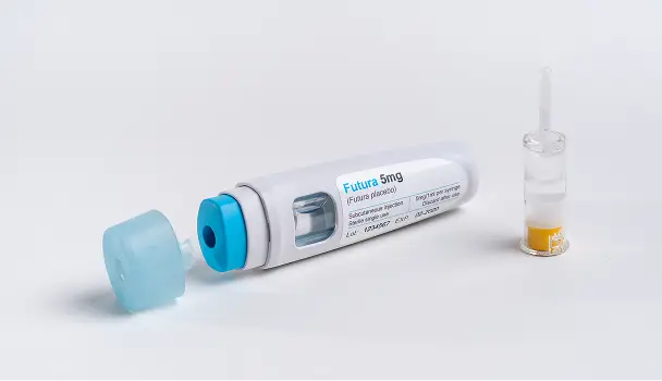 Subcutaneous injection pen labeled Futura 5mg with a detached blue cap and a small glass ampoule with yellow liquid on a white surface.