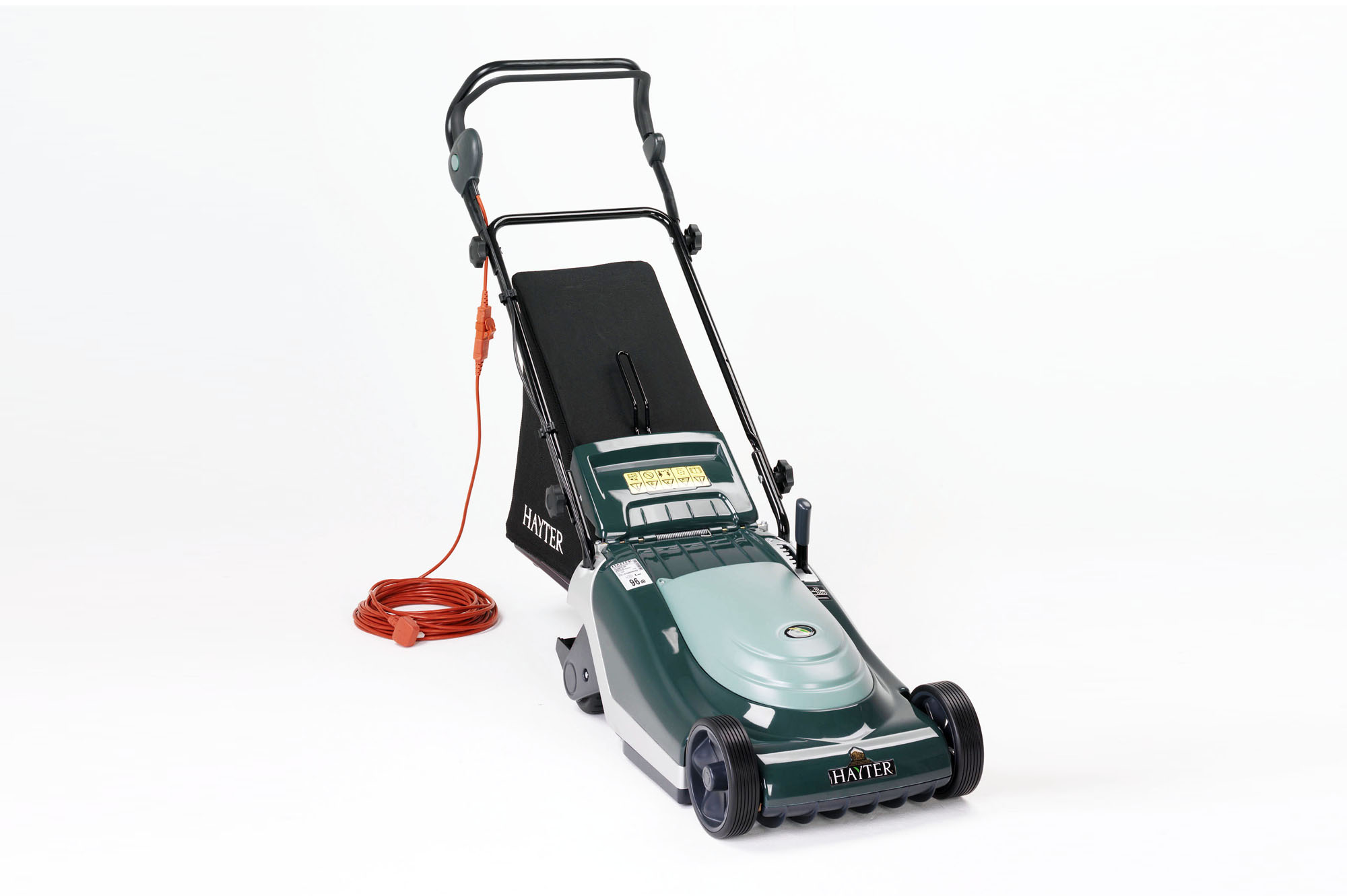 Green Hayter electric lawn mower with black grass collection bag and orange power cord.