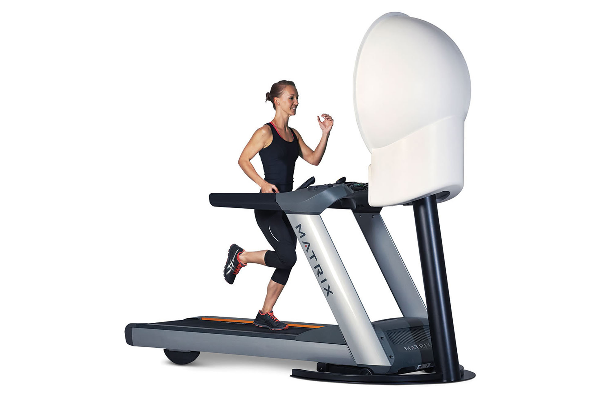 Woman running on a Matrix treadmill with a zone dome hood above the console.