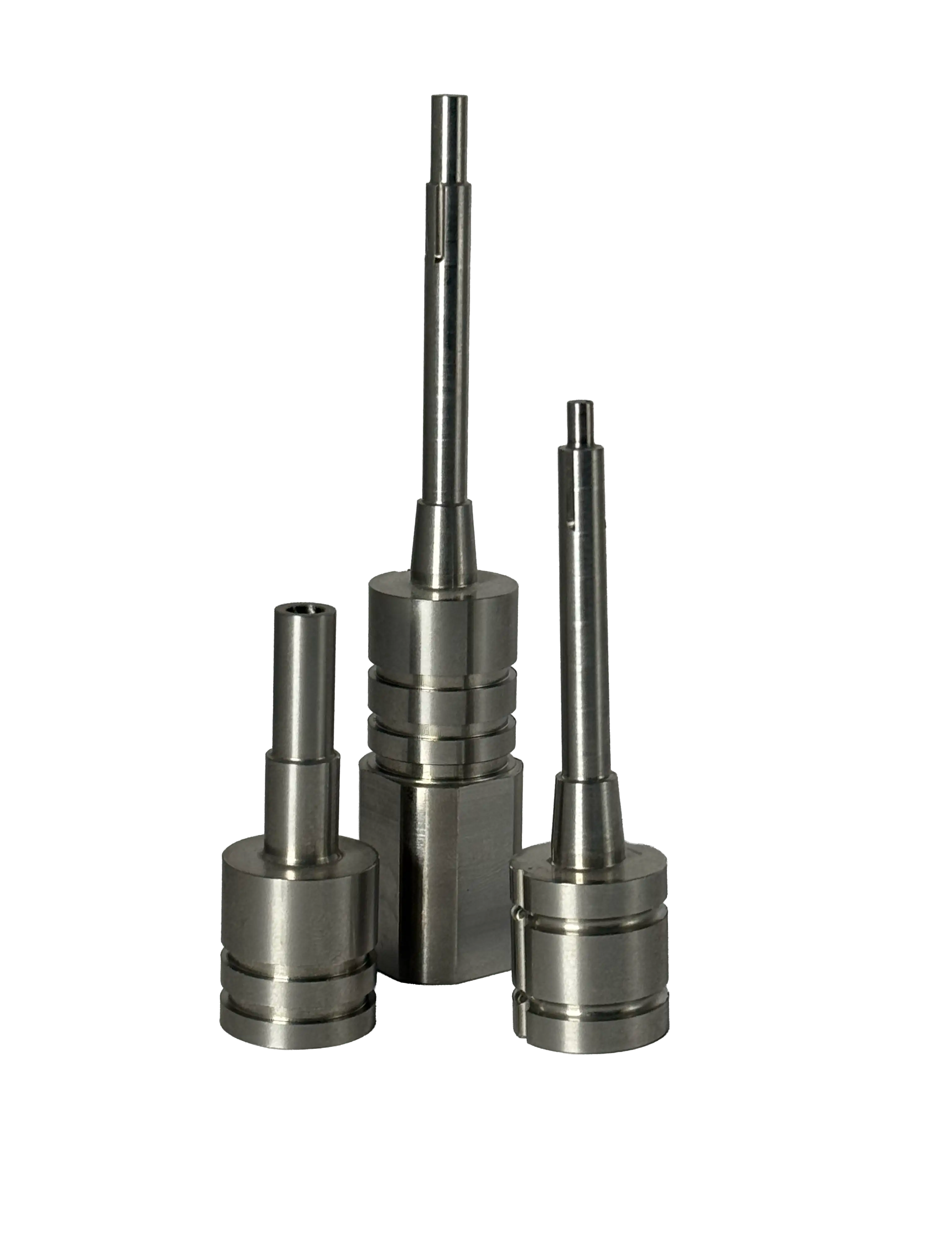 Three precision-engineered metallic cylindrical components with varying lengths and detailed grooves.