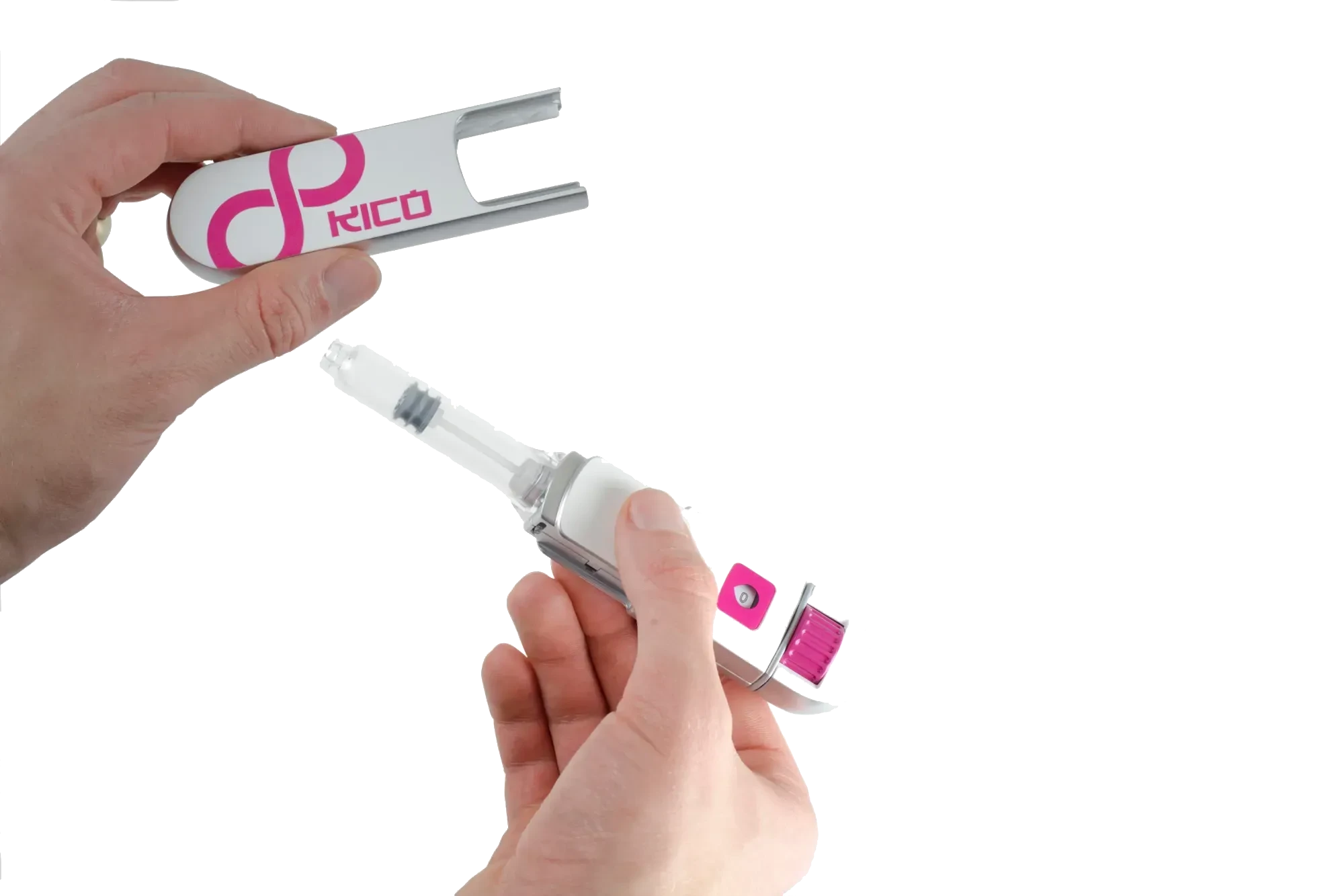 Hands assembling a white and pink Kico branded device with a clear nozzle and small pink component.