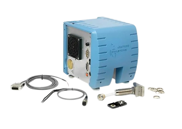Blue Ultra FAIMS Owlstone scientific instrument with cables and metal components on a white background.