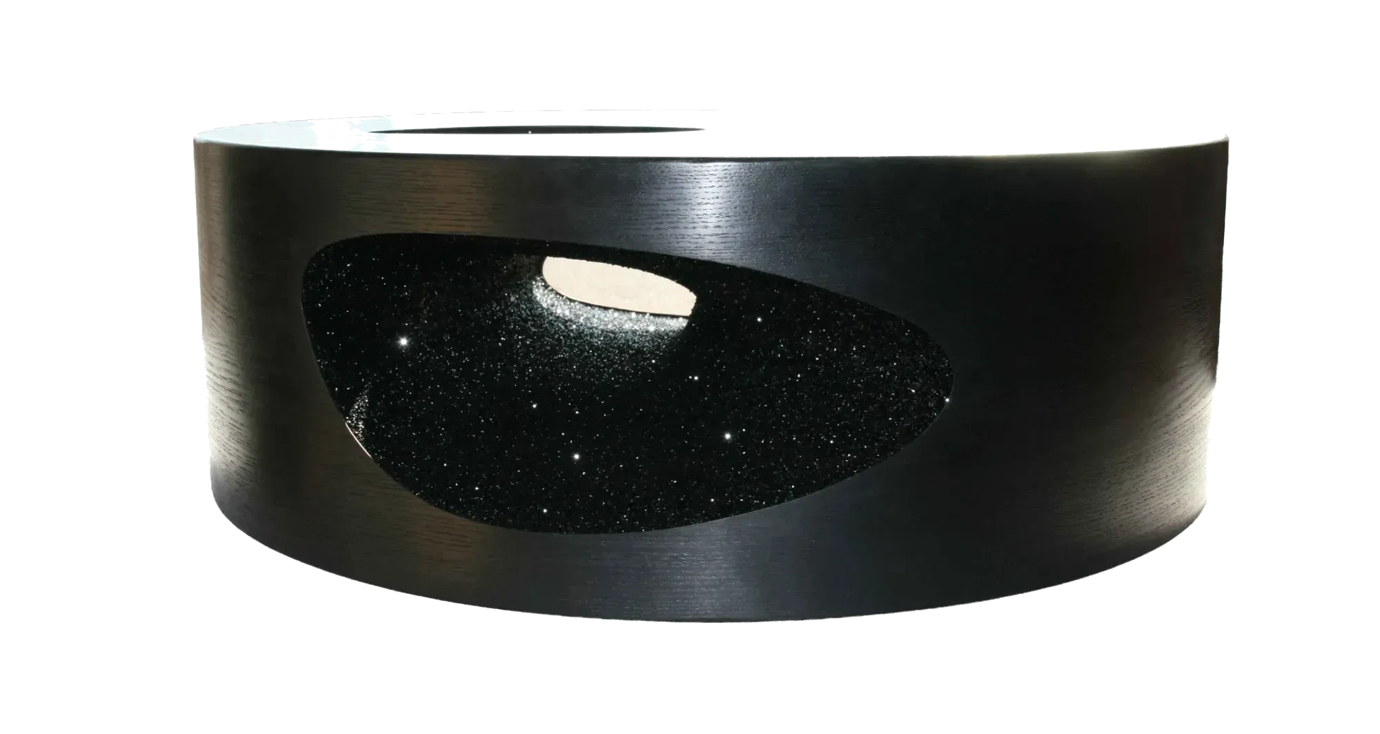 Curved black decorative object with an irregular oval cutout filled with a sparkling, star-like black surface.