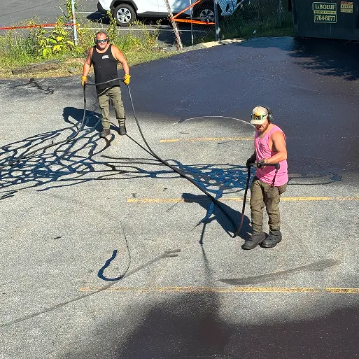 Jay and Colin sealcoating