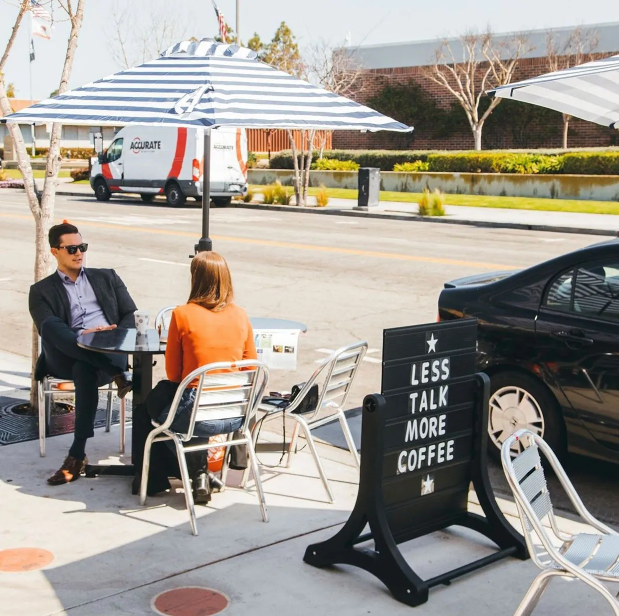 couple sitting at a Rockless Table Base