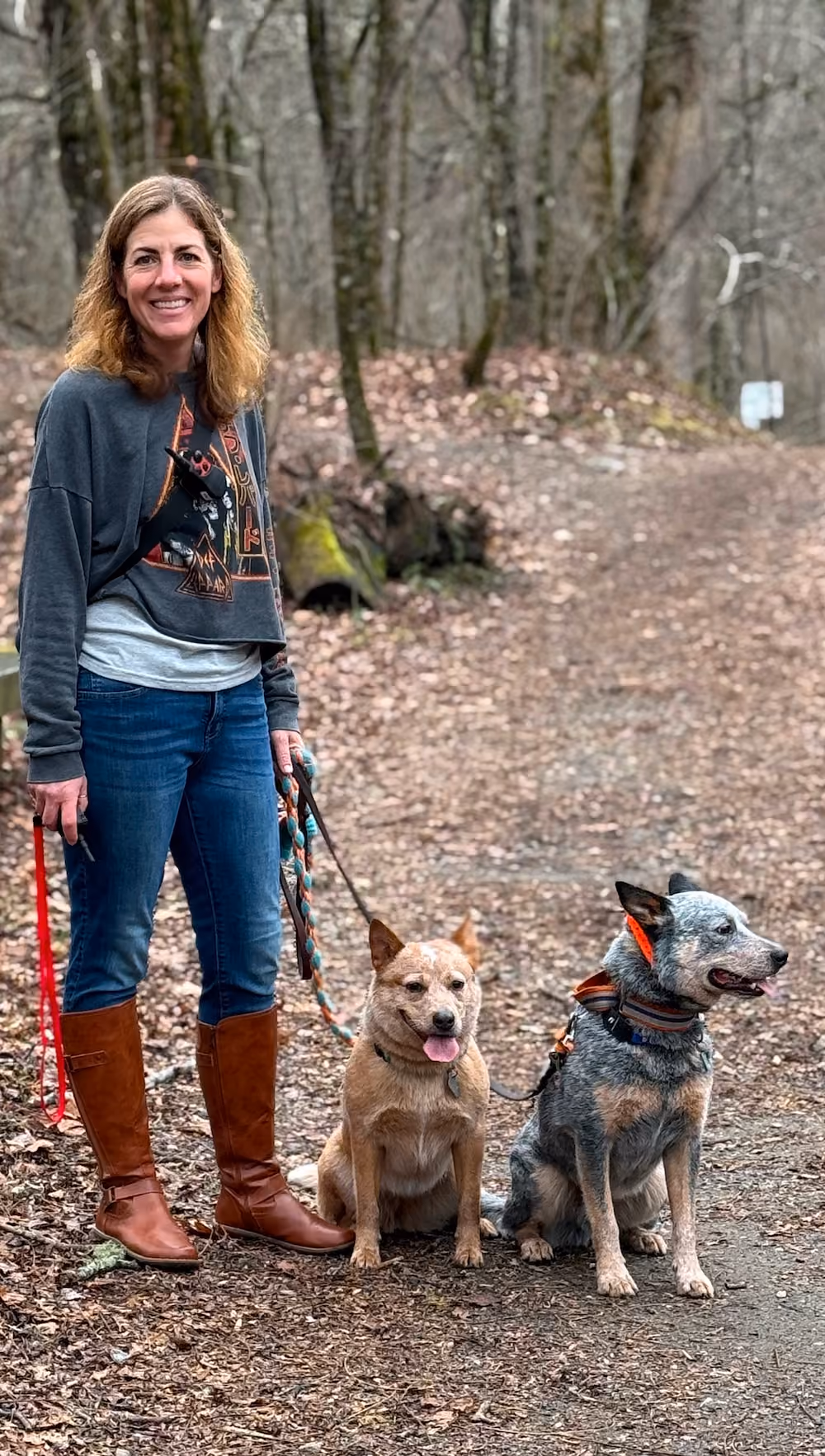 Kate Jackson with her dogs on the trail