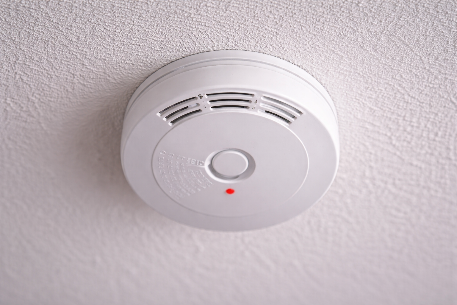 Smoke detector beeping on ceiling