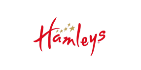 Hamleys brand name in red handwritten-style font with three gold stars above the letter 'm'.