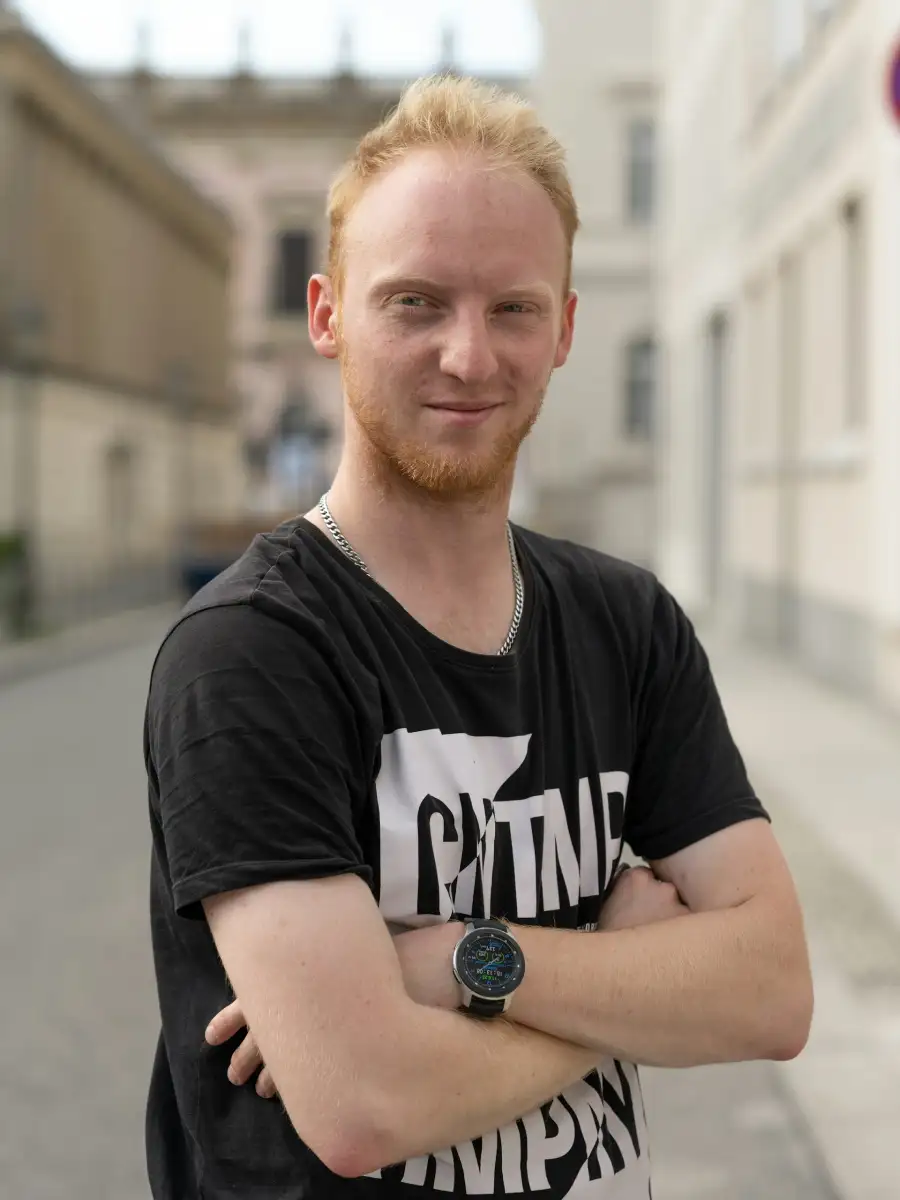 Portrait of a man standing outdoors
