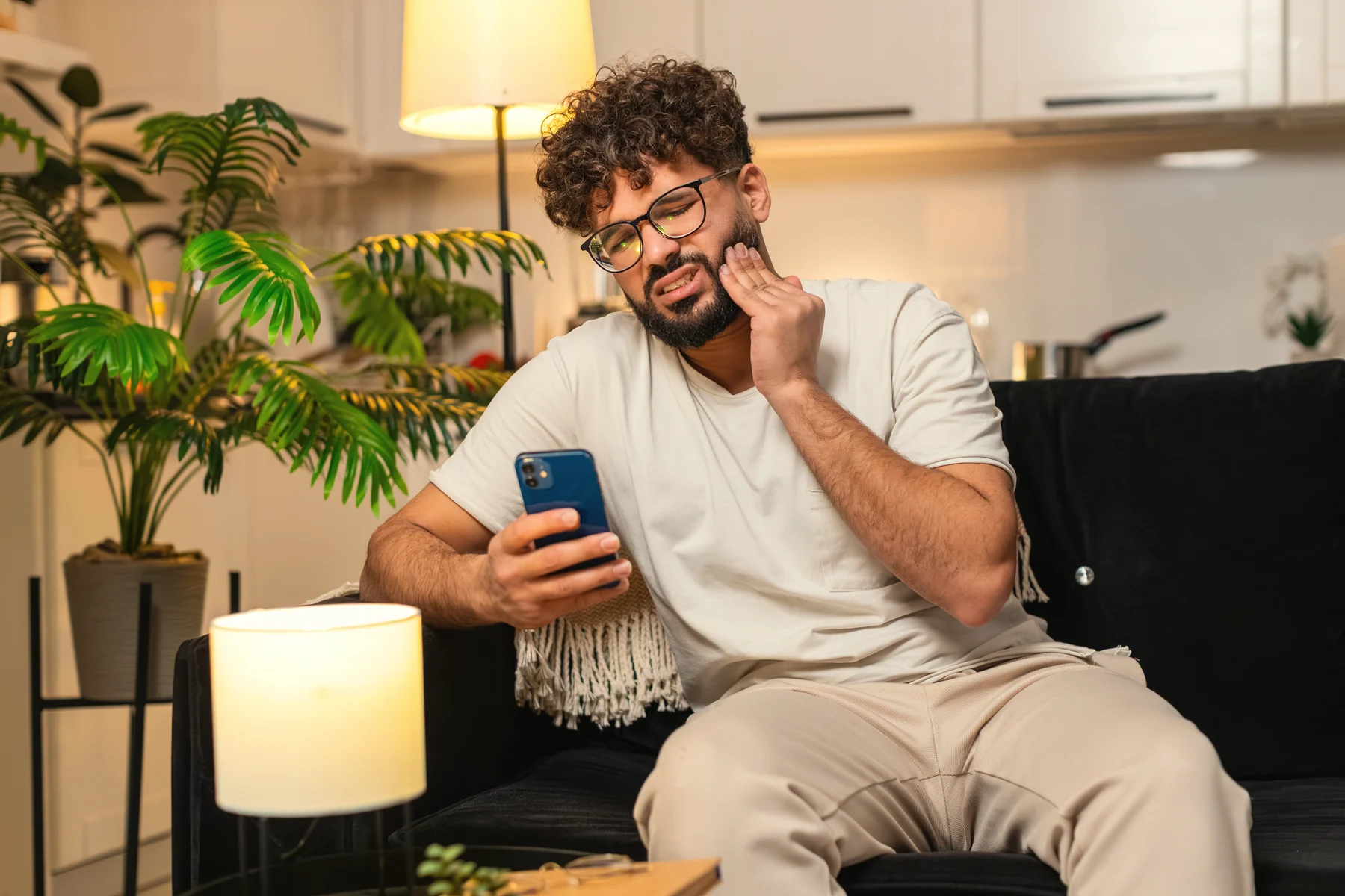 Man with a toothache looking for an emergency dentist in Kendall