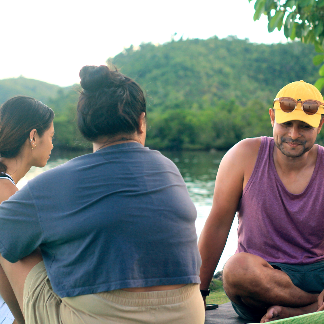wooden trey with tea leaves in a white cup