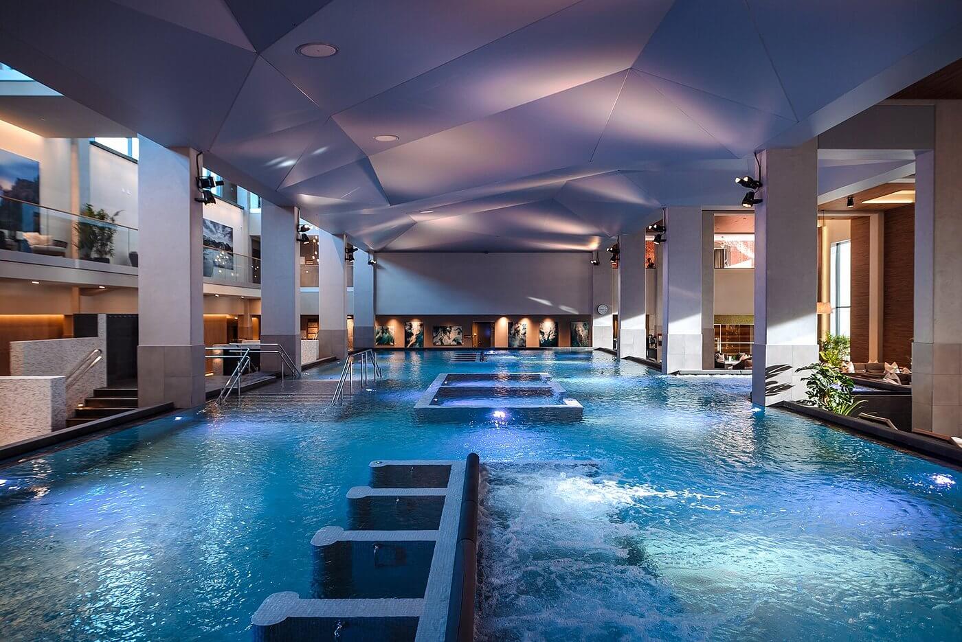 Indoor beautifully designed spa pool, illustrating Scandinavian arctic hot spring experiences