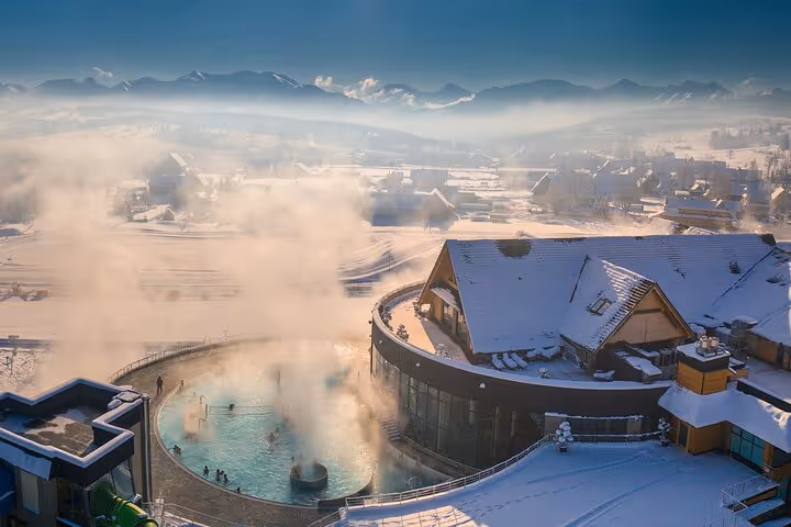 Chocholowskie Thermal Baths near Chochołów with tatra mountains in the background
