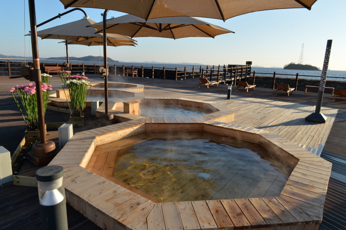 Outdoor thermal baths on a beach in  Seokmodo Mineral Hot Spring, South Korea