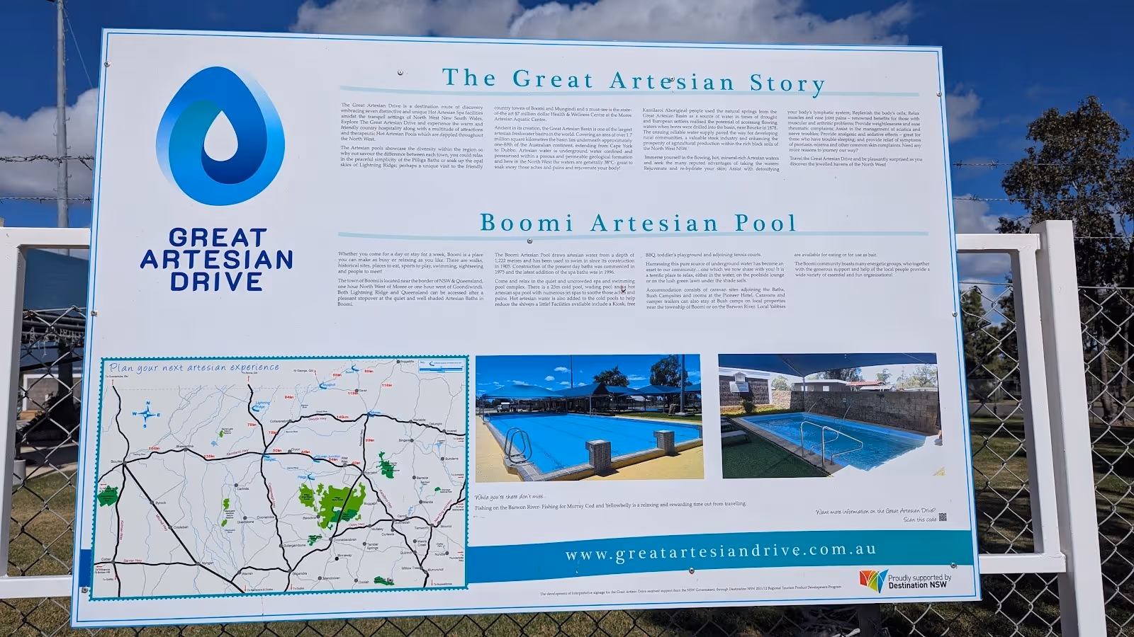 Informational sign about the Boomi Artesian Pool and Great Artesian Drive featuring maps and photos of the spa pools.