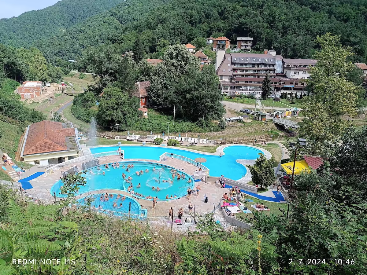Sijarinska banja outdoor pools with valley backdrop
