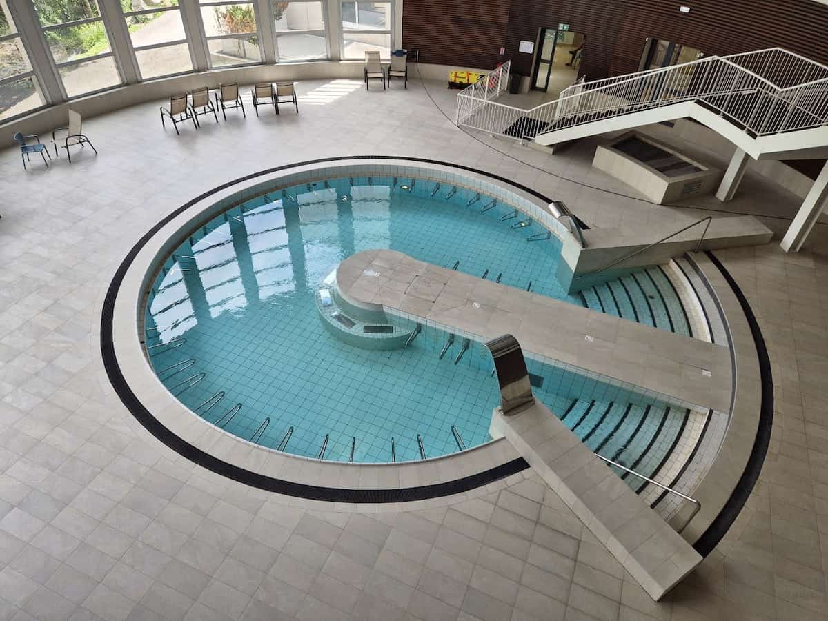 Thermes de Luchon Ressources Vous, France - rooftop thermal pool overlooking Pyrenean peaks in Bagneres-de-Luchon
