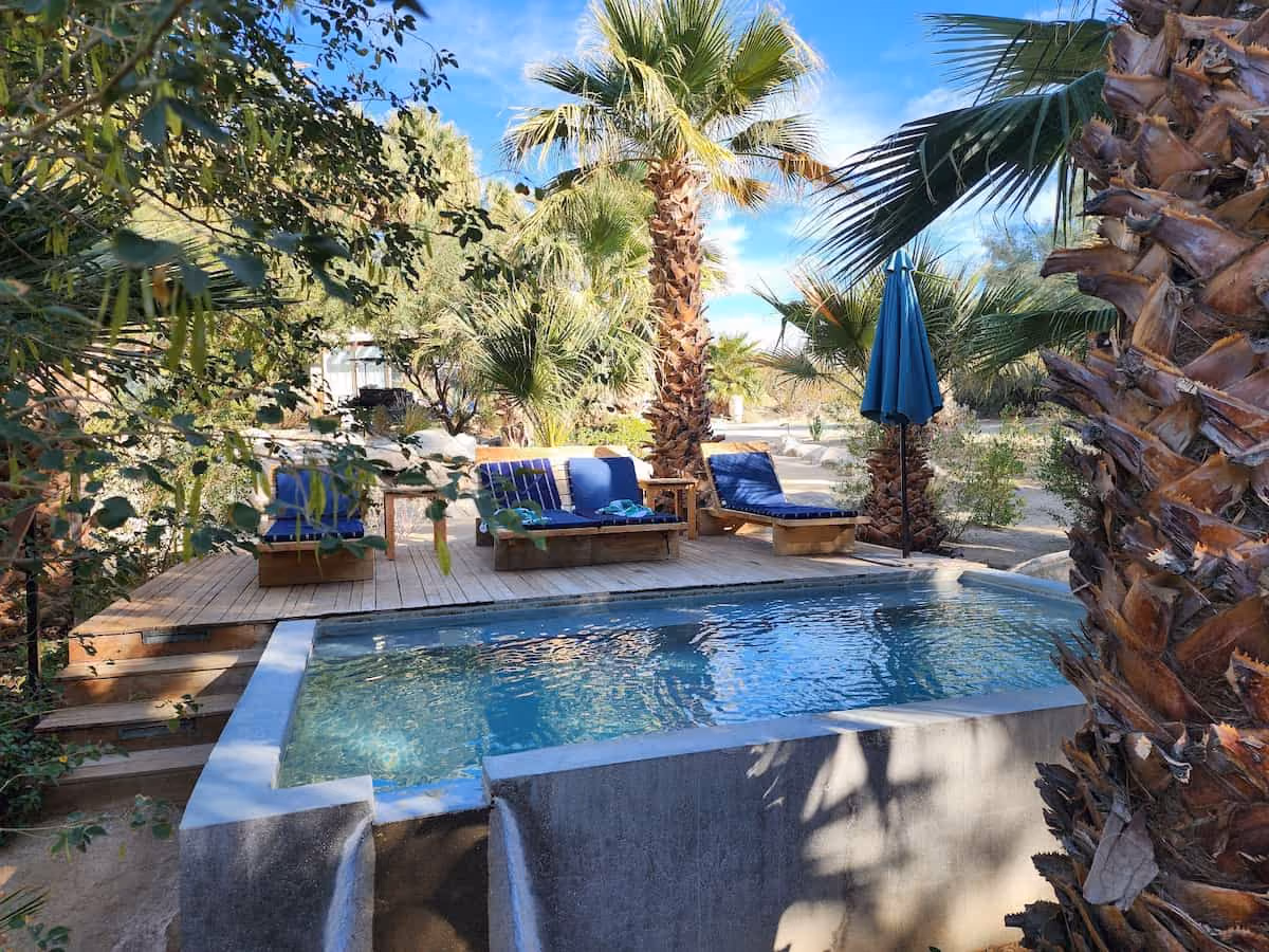 Two Bunch Palms, California - The Grotto mineral spring pool with palm trees in Desert Hot Springs