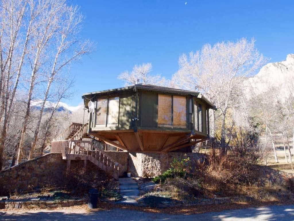 Treehouse Hot Springs, Colorado - elevated octagon lodge with private hot spring pool on Chalk Creek