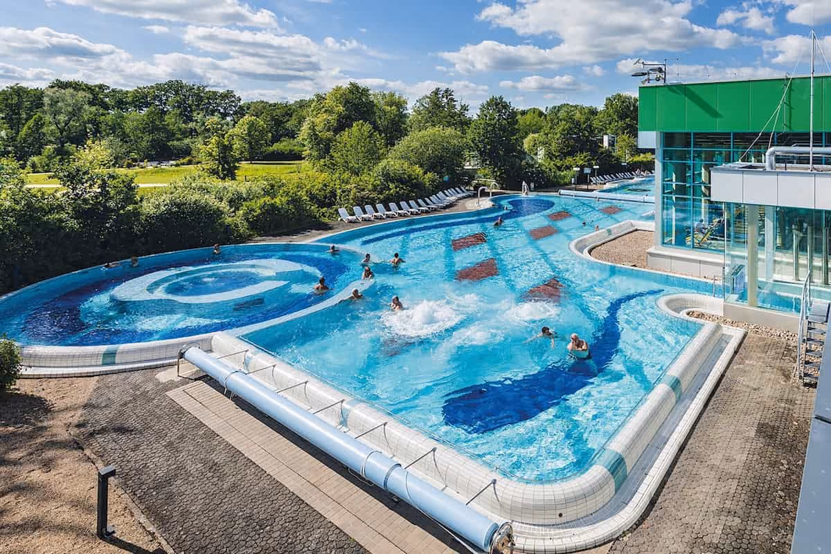 Jod-Sole-Therme Bad Bevensen, Germany - outdoor iodine-brine pool with glass facade and spa park