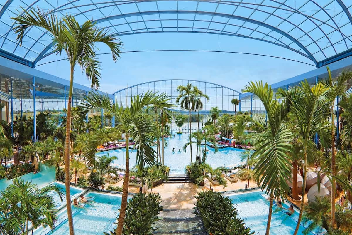 Thermen Badewelt Sinsheim, Germany - tropical palm hall with turquoise lagoon pools and glass roof
