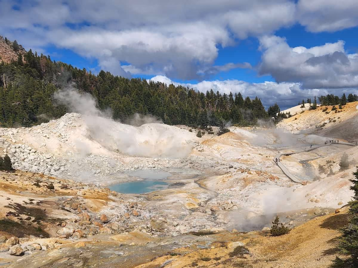 Bumpass Hell Trail, California - steaming hydrothermal basin with boiling pools and fumaroles viewed from boardwalk in Lassen Volcanic National Park