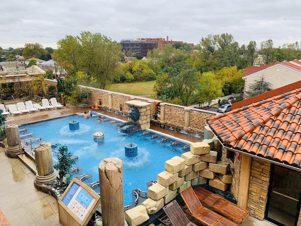 Outdoor swimming pool with New York city views at Spa Castle New York 