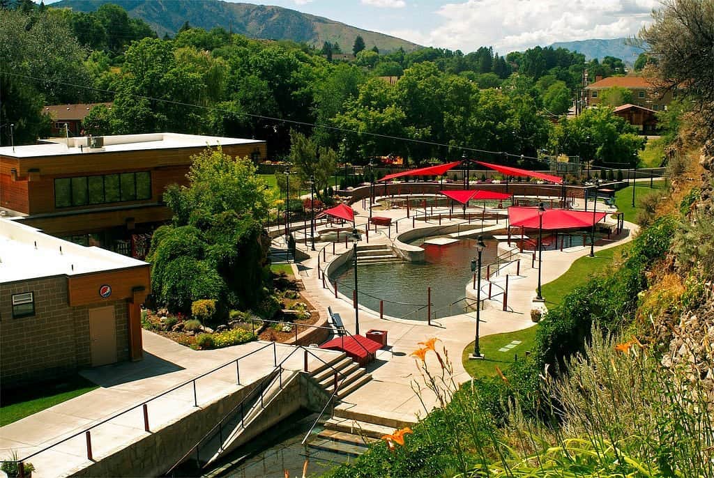 Outdoor hot spring pools in a forested valley at Lava Hot Springs Foundation in Idaho