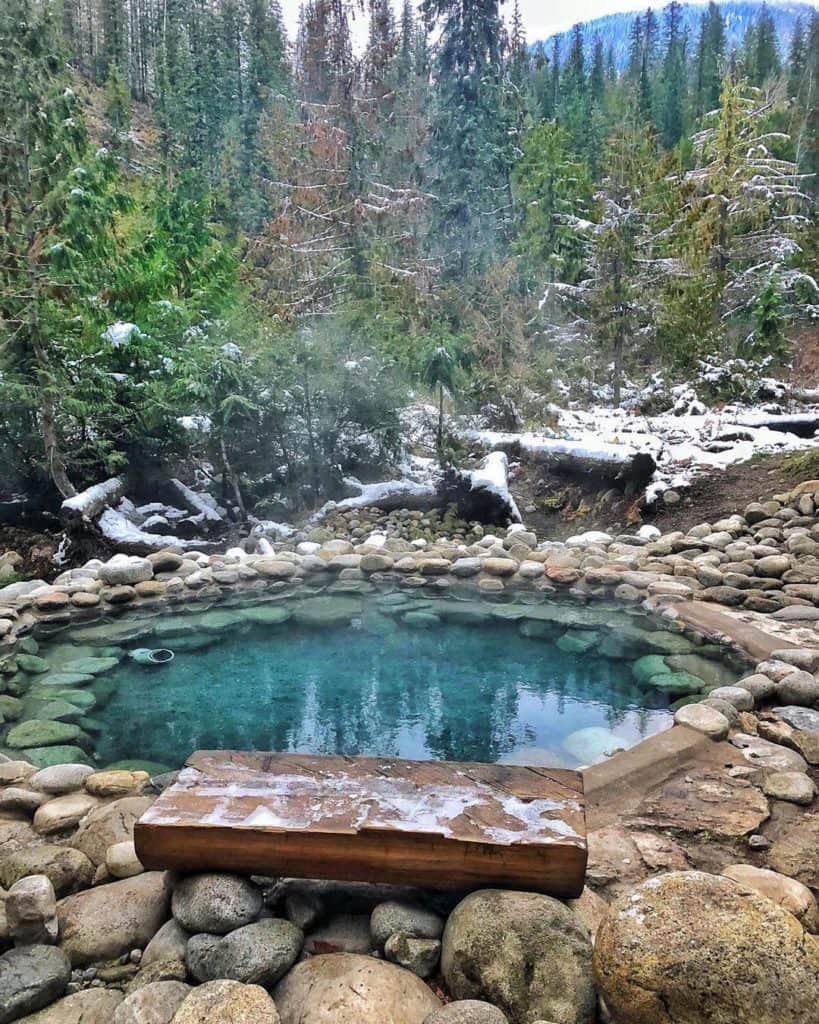 Outdoor hot spring pool in a forest setting at halfway hot springs british columbia canada