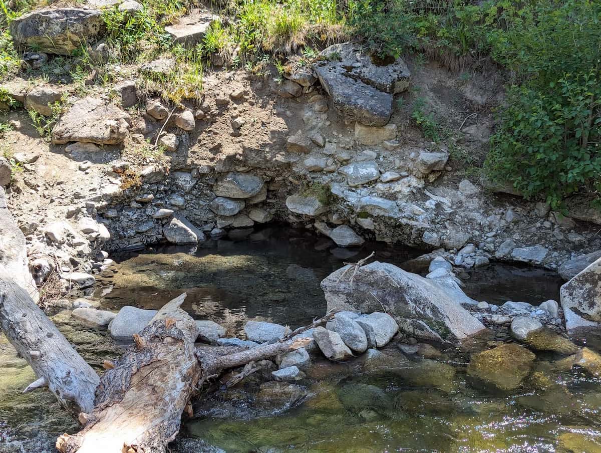 rock-walled hot spring pools along Warm Springs Creek at frenchman's bend hot springs in idaho