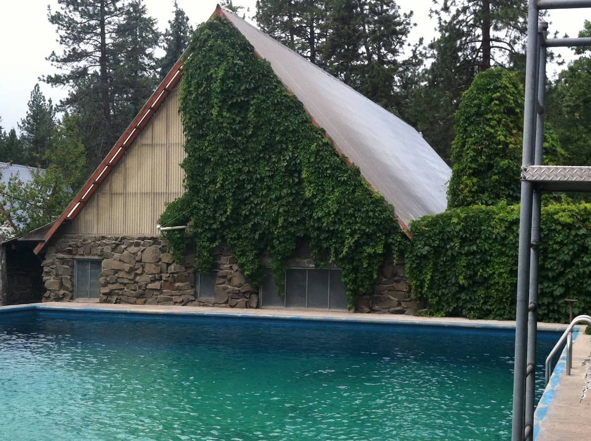 Outdoor hot spring pool and cabin house at starkey hot springs idaho