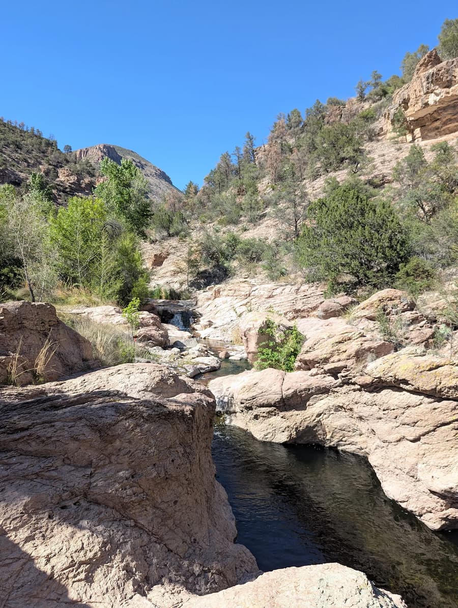 Natural hot spring pools surrounded by rocks at turkey creek hot springs new mexico