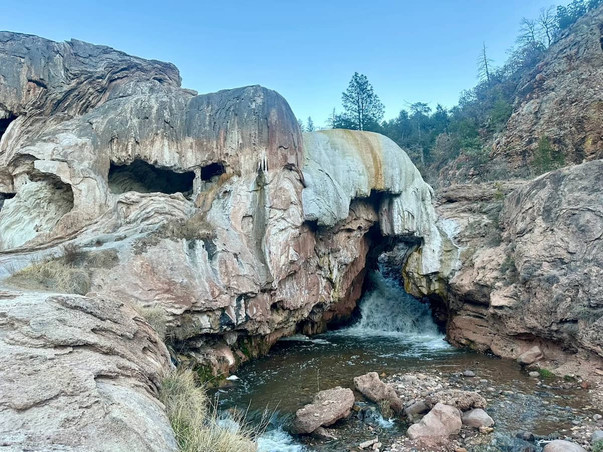 Natural rock dam with hot spring waterfall at soda dam hot spring new mexico